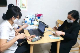 Hà Nội: Chi trả lương hưu qua thẻ ATM để phòng dịch Covid-19