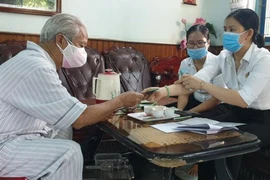 TP.HCM chi trả gộp lương hưu tháng 7 và tháng 8 như thế nào tại địa bàn cách ly, phong toả
