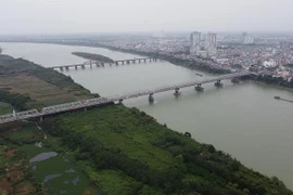 Thương tâm phát hiện nạn nhân rơi xuống sông Hồng đang mang thai