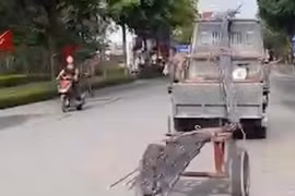 Hãi hùng xe chở thép dài hàng chục mét 'đánh võng' trên phố