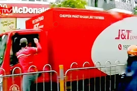 Bắt giữ lái xe tải tấn công đồng nghiệp giữa trời mưa