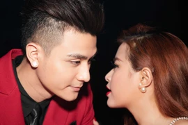 Hoàng Thuỳ Linh gợi cảm và tình tứ bên Vĩnh Thụy