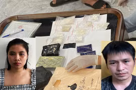 Bắt hai vợ chồng mua bán trái phép ma túy
