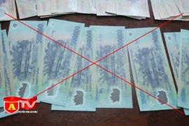 Hành vi làm, tàng trữ, vận chuyển và lưu hành tiền giả bị pháp luật xử lý như thế nào?