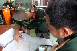 Bàn giải pháp đưa thi thể các phi công gặp nạn xuống núi