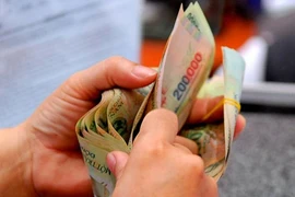 Hà Nội: Thưởng Tết 2015 của công nhân sẽ nhỉnh hơn so với Tết 2014