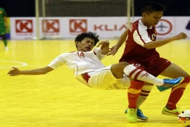 Futsal Việt Nam dội "bàn thắng" vào lưới đội Lào 18-0
