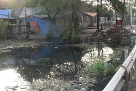 Gần trạm bơm vẫn ngập