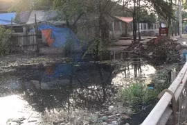 Gần trạm bơm vẫn ngập