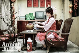 Thiếu nữ Hà Nội đẹp mơ màng trong hình ảnh gợi nhớ Tết xưa