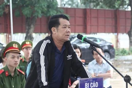 Dùng súng dằn mặt người đi đường, giám đốc công ty bảo vệ lĩnh án 18 tháng tù