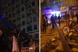 Xe cẩu ‘tựa’ chung cư, 1 công nhân bị vùi lấp