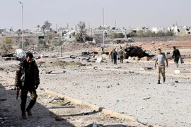 Khoảng 3.000 phiến quân đầu hàng ở Syria sau đàm phán căng thẳng