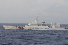 Tàu có vũ trang Trung Quốc tiến gần đảo tranh chấp với Nhật Bản
