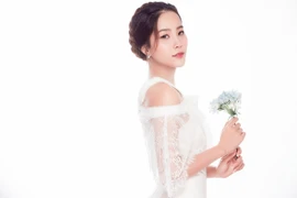 Hoa Khôi Nam Em xinh đẹp, dịu dàng trong bộ ảnh mới 