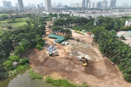 Có hay không việc lợi dụng thi công đường Lê Quang Đạo kéo dài để lấp hồ Blốc?