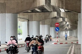 Tổ chức lại giao thông cho xe máy qua nút giao Nghiêm Xuân Yêm- Nguyễn Hữu Thọ