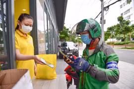 Grab hỗ trợ chi phí xét nghiệm Covid-19 cho đối tác tài xế tại TP.HCM