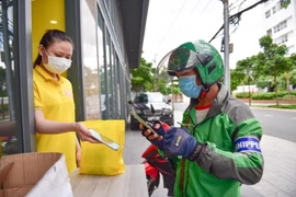 Grab hỗ trợ chi phí xét nghiệm Covid-19 cho đối tác tài xế tại TP.HCM