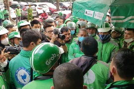 Grab tăng cước khi bị áp thuế: Ai là người chịu thiệt cuối cùng?