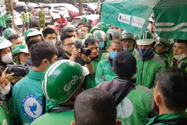 Grab tăng cước khi bị áp thuế: Ai là người chịu thiệt cuối cùng?
