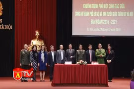 Ký kết công tác phối hợp giữa CATP và Ban Tuyên giáo Thành ủy Hà Nội