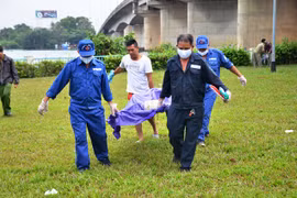 Đi câu cá tá hỏa phát hiện thi thể người đàn ông trôi sông