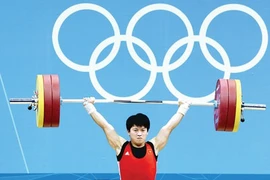 Lực sỹ Việt Nam bất ngờ có huy chương Olympic từ... 8 năm trước