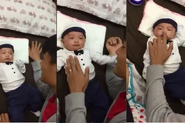 Kỳ Hân khoe clip Mạc Hồng Quân vui đùa bên con trai