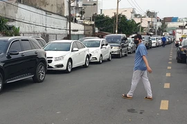 Quá hạn đăng kiểm do trung tâm quá tải, chủ xe có được miễn xử phạt?