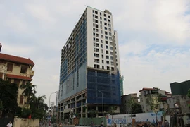 Sáng mai 6-3 cưỡng chế tháo dỡ phần sai phạm tại công trình 8B Lê Trực 