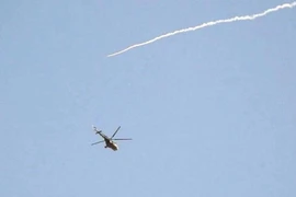 [ẢNH] Trực thăng Nga thoát nạn trong gang tấc trước tên lửa phòng không phiến quân