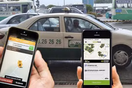 Nhiều hãng taxi dừng "bắt tay" với Grab taxi