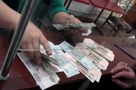 Crimea chính thức chuyển sang sử dụng đồng rouble của Nga