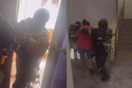 Bé sơ sinh cùng mẹ được lính cứu hỏa Công an Hà Nội hướng dẫn thoát khỏi đám cháy căn chung cư tầng 26
