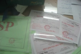 Giám đốc Công ty in ấn chuyên… làm giả giấy phép ô tô vào phố cấm