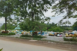 Loay hoay chống nạn đổ trộm rác, phế thải xây dựng trên đường Chu Văn An 