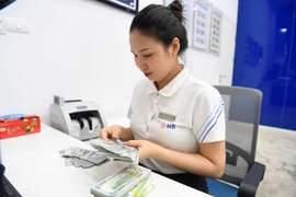 Ngân hàng Nhà nước bán USD can thiệp, tỷ giá sẽ “bớt nóng”?