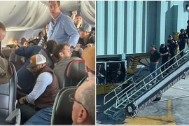 Máy bay phải quay đầu vì hành khách cố mở cửa thoát hiểm trên không