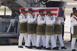 Vụ MH17: Thi thể 20 nạn nhân Malaysia đầu tiên về đến Kuala Lumpur 