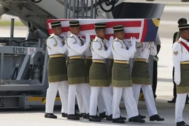 Vụ MH17: Thi thể 20 nạn nhân Malaysia đầu tiên về đến Kuala Lumpur 