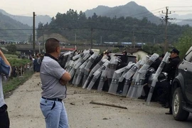 Trung Quốc biểu tình khiến hàng chục người bị thương