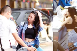 Trà Ngọc Hằng khoe vòng eo con kiến ở sân bay