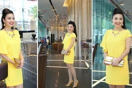 Lê Khánh diện đầm vàng trẻ trung đi dự ra mắt phim