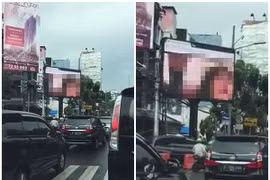 Nhân viên IT phát cảnh nóng lên biển quảng cáo trung tâm Jakarta