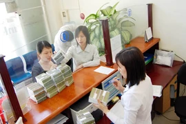 Cổ đông lớn cản trở tái cơ cấu ngân hàng 