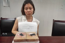 Người đàn bà vận chuyển ma túy bằng xe khách