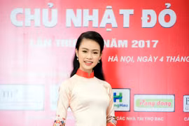 "Cô gái vàng" Hoa hậu Việt Nam 2016 rạng ngời dự họp báo "Ngày chủ nhật Đỏ"