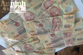 Mang tiền giả đến khu vực vùng sâu, vùng xa để tiêu thụ