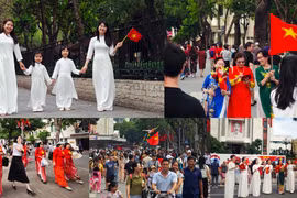 Người Hà Nội tự hào mang cờ Tổ quốc tô điểm phố phường rực rỡ